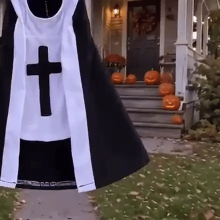Cat wearing the FurryPalace nun Halloween costume